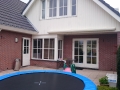 Veranda, Veranda Plaza, Glazen schuifwanden, terrasoverkapping, overkapping, buitenkamer, tuinkamer, Carport houtkachel, lichtstraat, daklicht, balustrade, hekwerk, terrasverwarming, tuin, terras, houten vloer.