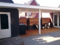 Veranda, Veranda Plaza, Glazen schuifwanden, terrasoverkapping, overkapping, buitenkamer, tuinkamer, Carport houtkachel, lichtstraat, daklicht, balustrade, hekwerk, terrasverwarming, tuin, terras, houten vloer.