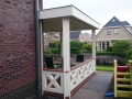 Veranda, Veranda Plaza, Glazen schuifwanden, terrasoverkapping, overkapping, buitenkamer, tuinkamer, Carport houtkachel, lichtstraat, daklicht, balustrade, terrasverwarming, tuin, terras, houten vloer.