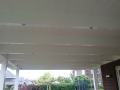 Veranda, Veranda Plaza, Glazen schuifwanden, terrasoverkapping, overkapping, buitenkamer, tuinkamer, Carport houtkachel, lichtstraat, daklicht, balustrade, terrasverwarming, tuin, terras, houten vloer.