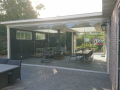 Veranda, Veranda Plaza,  terrasoverkapping, overkapping, buitenkamer, tuinkamer, Carport houtkachel, lichtstraat, daklicht, Glazen schuifwanden, balustrade, hekwerk, terrasverwarming, tuin, terras, houten vlondervloer.