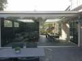 Veranda, Veranda Plaza,  terrasoverkapping, overkapping, buitenkamer, tuinkamer, Carport houtkachel, lichtstraat, daklicht, Glazen schuifwanden, balustrade, hekwerk, terrasverwarming, tuin, terras, houten vlondervloer.