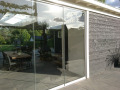 Veranda, Veranda Plaza,  terrasoverkapping, overkapping, buitenkamer, tuinkamer, Carport houtkachel, lichtstraat, daklicht, Glazen schuifwanden, balustrade, hekwerk, terrasverwarming, tuin, terras, houten vlondervloer.
