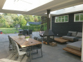Veranda, Veranda Plaza,  terrasoverkapping, overkapping, buitenkamer, tuinkamer, Carport houtkachel, lichtstraat, daklicht, Glazen schuifwanden, balustrade, hekwerk, terrasverwarming, tuin, terras, houten vlondervloer.