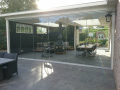 Veranda, Veranda Plaza,  terrasoverkapping, overkapping, buitenkamer, tuinkamer, Carport houtkachel, lichtstraat, daklicht, Glazen schuifwanden, balustrade, hekwerk, terrasverwarming, tuin, terras, houten vlondervloer.