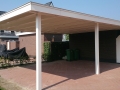 Carport Veranda, Veranda Plaza, Glazen schuifwanden, terrasoverkapping, overkapping, buitenkamer, tuinkamer, houtkachel, lichtstraat, daklicht, balustrade, terrasverwarming, tuin, terras, houten vloer.