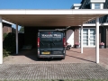 Carport Veranda, Veranda Plaza, Glazen schuifwanden, terrasoverkapping, overkapping, buitenkamer, tuinkamer, houtkachel, lichtstraat, daklicht, balustrade, terrasverwarming, tuin, terras, houten vloer.