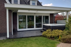 Veranda, Veranda Plaza,  terrasoverkapping, overkapping, buitenkamer, tuinkamer, Carport houtkachel, lichtstraat, daklicht, Glazen schuifwanden, balustrade, hekwerk, terrasverwarming, tuin, terras, houten vlondervloer.