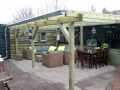 Veranda, Veranda Plaza,  terrasoverkapping, overkapping, buitenkamer, tuinkamer, Carport houtkachel, lichtstraat, daklicht, Glazen schuifwanden, balustrade, hekwerk, terrasverwarming, tuin, terras, houten vlondervloer.