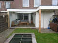 Veranda, Veranda Plaza,  terrasoverkapping, overkapping, buitenkamer, tuinkamer, Carport houtkachel, lichtstraat, daklicht, Glazen schuifwanden, balustrade, hekwerk, terrasverwarming, tuin, terras, houten vlondervloer.