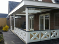 Veranda, Veranda Plaza,  terrasoverkapping, overkapping, buitenkamer, tuinkamer, Carport houtkachel, lichtstraat, daklicht, Glazen schuifwanden, balustrade, hekwerk, terrasverwarming, tuin, terras, houten vlondervloer.