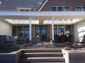 Veranda, Veranda Plaza,  terrasoverkapping, overkapping, buitenkamer, tuinkamer, Carport houtkachel, lichtstraat, daklicht, Glazen schuifwanden, balustrade, hekwerk, terrasverwarming, tuin, terras, houten vlondervloer.