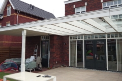 Veranda, Veranda Plaza,  terrasoverkapping, overkapping, buitenkamer, tuinkamer, Carport houtkachel, lichtstraat, daklicht, Glazen schuifwanden, balustrade, hekwerk, terrasverwarming, tuin, terras, houten vlondervloer.