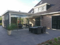 Veranda, Veranda Plaza,  terrasoverkapping, overkapping, buitenkamer, tuinkamer, Carport houtkachel, lichtstraat, daklicht, Glazen schuifwanden, balustrade, hekwerk, terrasverwarming, tuin, terras, houten vlondervloer.