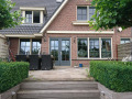 Veranda, Veranda Plaza,  terrasoverkapping, overkapping, buitenkamer, tuinkamer, Carport houtkachel, lichtstraat, daklicht, Glazen schuifwanden, balustrade, hekwerk, terrasverwarming, tuin, terras, houten vlondervloer.