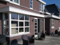 Veranda, Veranda Plaza,  terrasoverkapping, overkapping, buitenkamer, tuinkamer, Carport houtkachel, lichtstraat, daklicht, Glazen schuifwanden, balustrade, hekwerk, terrasverwarming, tuin, terras, houten vlondervloer.