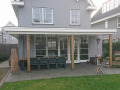 Veranda, Veranda Plaza,  terrasoverkapping, overkapping, buitenkamer, tuinkamer, Carport houtkachel, lichtstraat, daklicht, Glazen schuifwanden, balustrade, hekwerk, terrasverwarming, tuin, terras, houten vlondervloer.