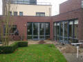 Veranda, Veranda Plaza,  terrasoverkapping, overkapping, buitenkamer, tuinkamer, Carport houtkachel, lichtstraat, daklicht, Glazen schuifwanden, balustrade, hekwerk, terrasverwarming, tuin, terras, houten vlondervloer.