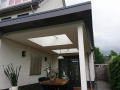 Veranda, Veranda Plaza, terrasoverkapping, overkapping, buitenkamer, tuinkamer, Carport houtkachel, lichtstraat, daklicht, glazen schuifwanden, balustrade, hekwerk, terrasverwarming, tuin, terras, houten vlondervloer.