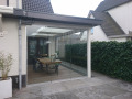 Veranda, Veranda Plaza, terrasoverkapping, overkapping, buitenkamer, tuinkamer, Carport houtkachel, lichtstraat, daklicht, glazen schuifwanden, balustrade, hekwerk, terrasverwarming, tuin, terras, houten vlondervloer.