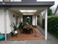 Veranda, Veranda Plaza, terrasoverkapping, overkapping, buitenkamer, tuinkamer, Carport houtkachel, lichtstraat, daklicht, glazen schuifwanden, balustrade, hekwerk, terrasverwarming, tuin, terras, houten vlondervloer.