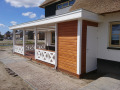 Veranda, Veranda Plaza, terrasoverkapping, overkapping, buitenkamer, tuinkamer, Carport houtkachel, lichtstraat, daklicht, Glazen schuifwanden, balustrade, hekwerk, terrasverwarming, tuin, terras, houten vlondervloer.