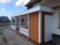 Veranda, Veranda Plaza, terrasoverkapping, overkapping, buitenkamer, tuinkamer, Carport houtkachel, lichtstraat, daklicht, Glazen schuifwanden, balustrade, hekwerk, terrasverwarming, tuin, terras, houten vlondervloer.
