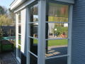 Veranda, Veranda Plaza, terrasoverkapping, overkapping, buitenkamer, tuinkamer, Carport houtkachel, lichtstraat, daklicht, Glazen schuifwanden, balustrade, hekwerk, terrasverwarming, tuin, terras, houten vlondervloer.