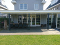 Veranda, Veranda Plaza, terrasoverkapping, overkapping, buitenkamer, tuinkamer, Carport houtkachel, lichtstraat, daklicht, Glazen schuifwanden, balustrade, hekwerk, terrasverwarming, tuin, terras, houten vlondervloer.