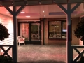 Veranda, Veranda Plaza, Glazen schuifwanden, terrasoverkapping, overkapping, buitenkamer, tuinkamer, Carport houtkachel, lichtstraat, daklicht, balustrade, hekwerk, terrasverwarming, tuin, terras, houten vloer.