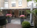 Veranda, Veranda Plaza, terrasoverkapping, overkapping, buitenkamer, tuinkamer, houtkachel, lichtstraat, Glazen schuifwanden, daklicht, balustrade, terrasverwarming, tuin, terras carport, terras, vlonder