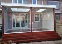 Veranda, Veranda Plaza, terrasoverkapping, overkapping, buitenkamer, tuinkamer, houtkachel, lichtstraat, Glazen schuifwanden, daklicht, balustrade, terrasverwarming, tuin, terras carport, terras, vlonder