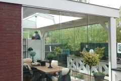Exclusieve Veranda Tuinkamer met Glazenschuifwanden en Lichtstraat van Veranda Plaza in Amstelveen