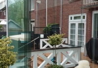 Exclusieve Veranda Tuinkamer met Glazenschuifwanden en Lichtstraat van Veranda Plaza in Amstelveen