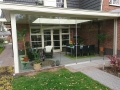 Veranda, Veranda Plaza, Glazen schuifwanden, terrasoverkapping, overkapping, buitenkamer, tuinkamer, Carport houtkachel, lichtstraat, daklicht, balustrade, hekwerk, terrasverwarming, tuin, terras, houten vloer.