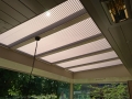 Veranda, Veranda Plaza, Glazen schuifwanden, terrasoverkapping, overkapping, buitenkamer, tuinkamer, Carport houtkachel, lichtstraat, daklicht, balustrade, hekwerk, terrasverwarming, tuin, terras, houten vloer.