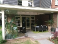 Veranda, Veranda Plaza, Glazen schuifwanden, terrasoverkapping, overkapping, buitenkamer, tuinkamer, Carport houtkachel, lichtstraat, daklicht, balustrade, hekwerk, terrasverwarming, tuin, terras, houten vloer.